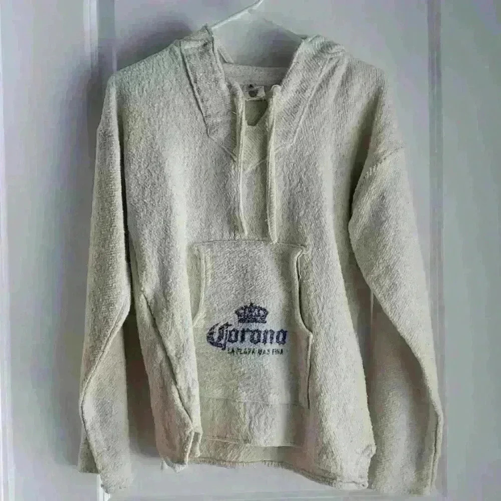 Women's Small or Kids large Corona Poncho from Mexico.
